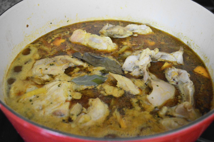 The moroccan chicken simmering away on the stove. 