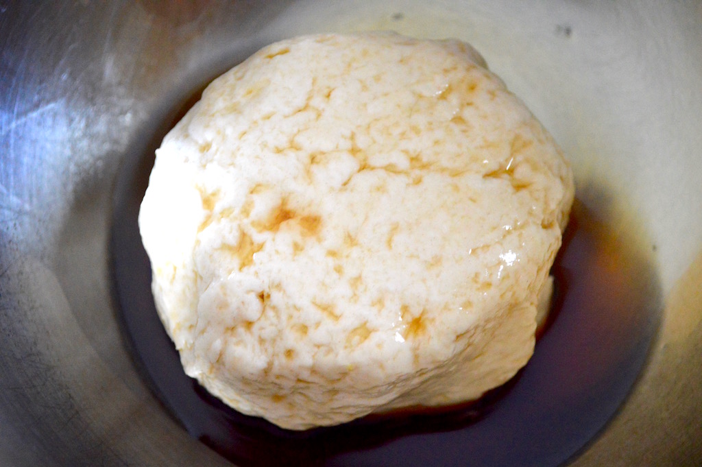 The dough needed to rest to let the gluten relax for an hour. That was going to make the Chinese scallion bread soft and tender on the inside. I let it sit in sesame oil to keep it from sticking and to also absorb its flavor!