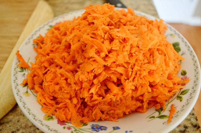 A small mountain of grated sweet potatoes. This is going to form the bottom later of the sausage sweet potato casserole!