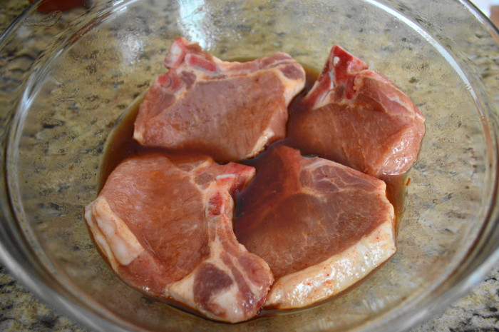 I submerged and coated the pork chops in the yummy marinade. 