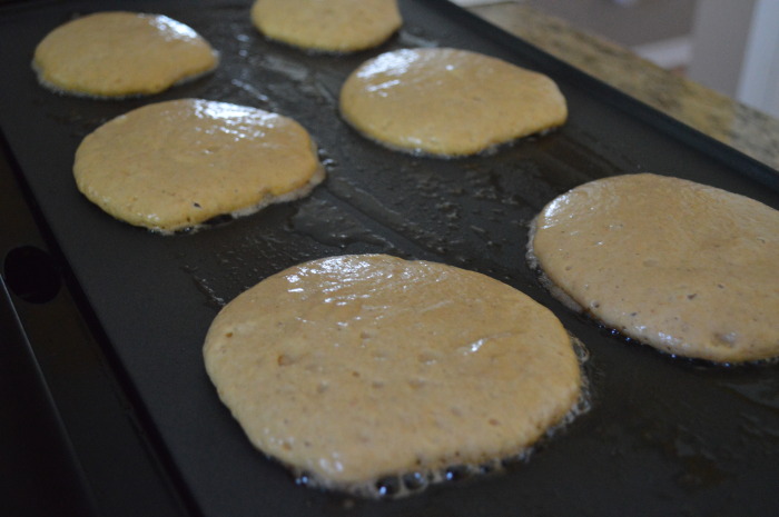 The pumpkin pancakes cooking away on the griddle!