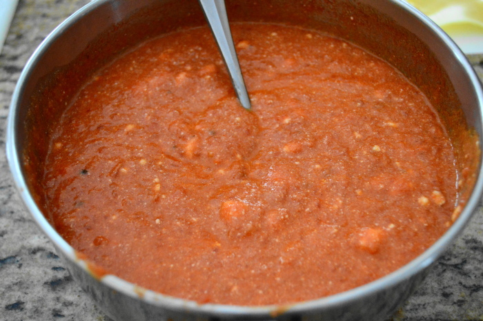 The creamy marinara sauce for the shrimp scampi lasagna rolls