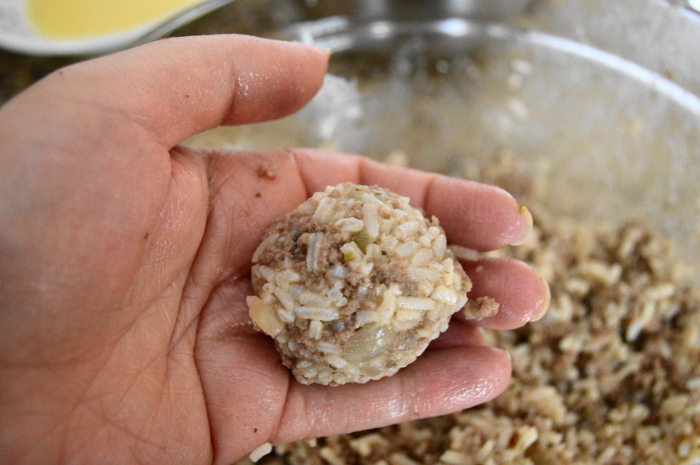 Rolling the beef arancini into perfect little balls. 