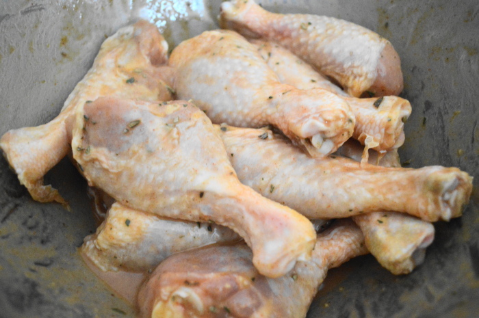 The spicy honey mustard chicken legs all gorgeously bathed in the marinade.