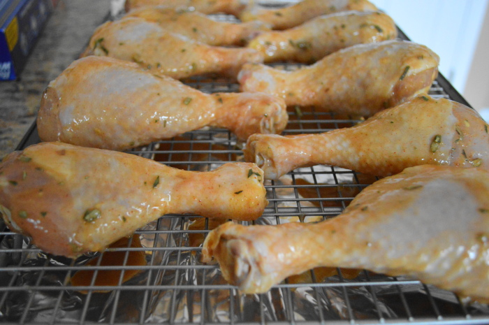The spicy honey mustard chicken legs all lined up and ready to cook. 