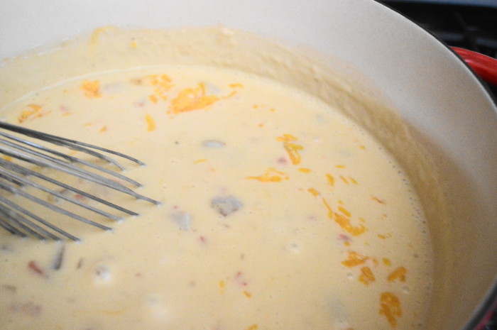 The cheddar bacon beer soup getting whisked smooth. 