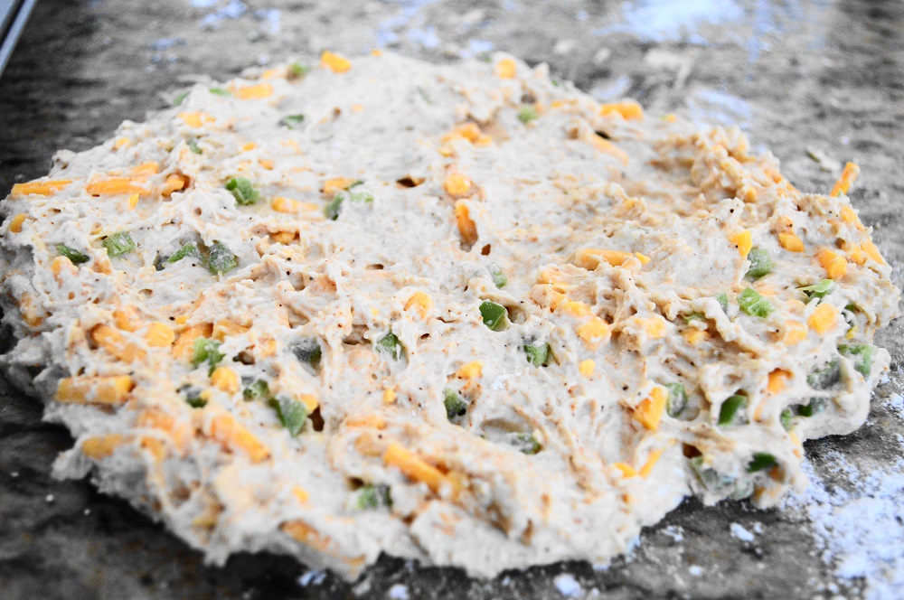 I turned out that dough onto my clean, well floured surface. I didn't even knead it so that it wouldn't be overworked. I just gently pressed it out into a disc that was about 1/2 an inch thick. 