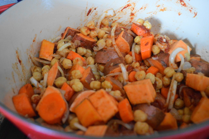 The onion, sweet potatoes, carrots and chickpeas give so much heft and flavor to the Moroccan surf and turf stew. 