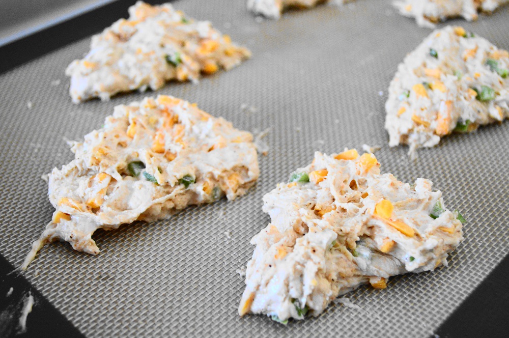 I took that disc and cut it with my floured pastry cutter into eight equal wedges. The cheddar jalapeno scones were looking perfectly imperfect and craggy!