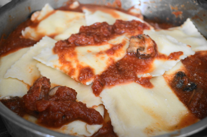 The four cheese ravioli tossed with the mushroom marinara sauce and smelling glorious! 