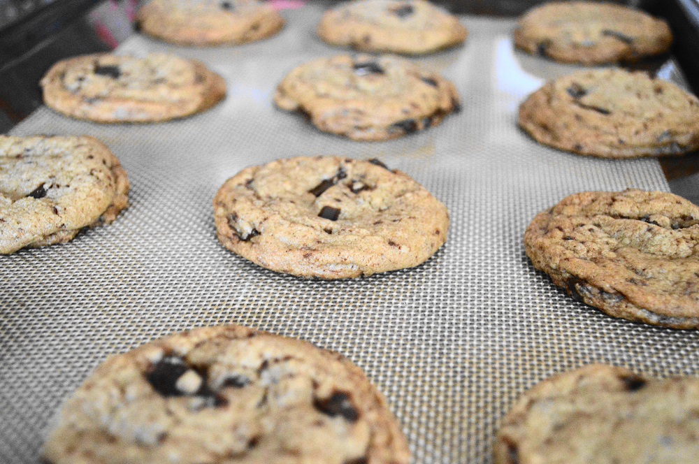 I ended up yielding 45 brown butter chocolate chunk cookies total. So I had a dozen per sheet except for the last sheet which just had nine. The cookies baked for 12 minutes until gloriously golden!