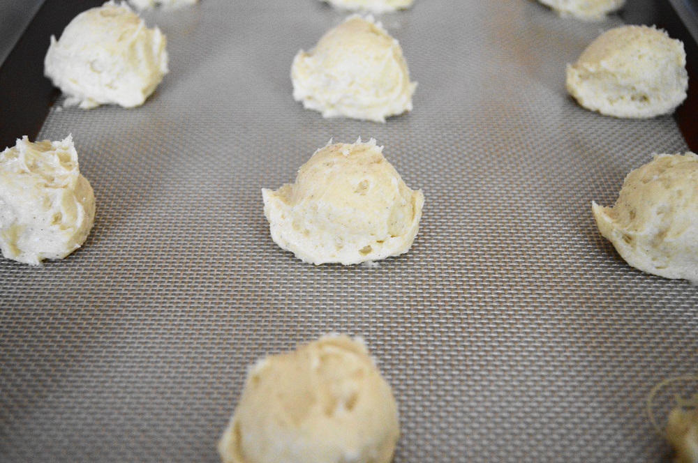 I used my trusty cookie scoop to dollop perfect portions of the dough onto my lined cookie sheets. I filled up four sheets with twelve cookies each, so this recipe yielded 48 mascarpone rose cookies.