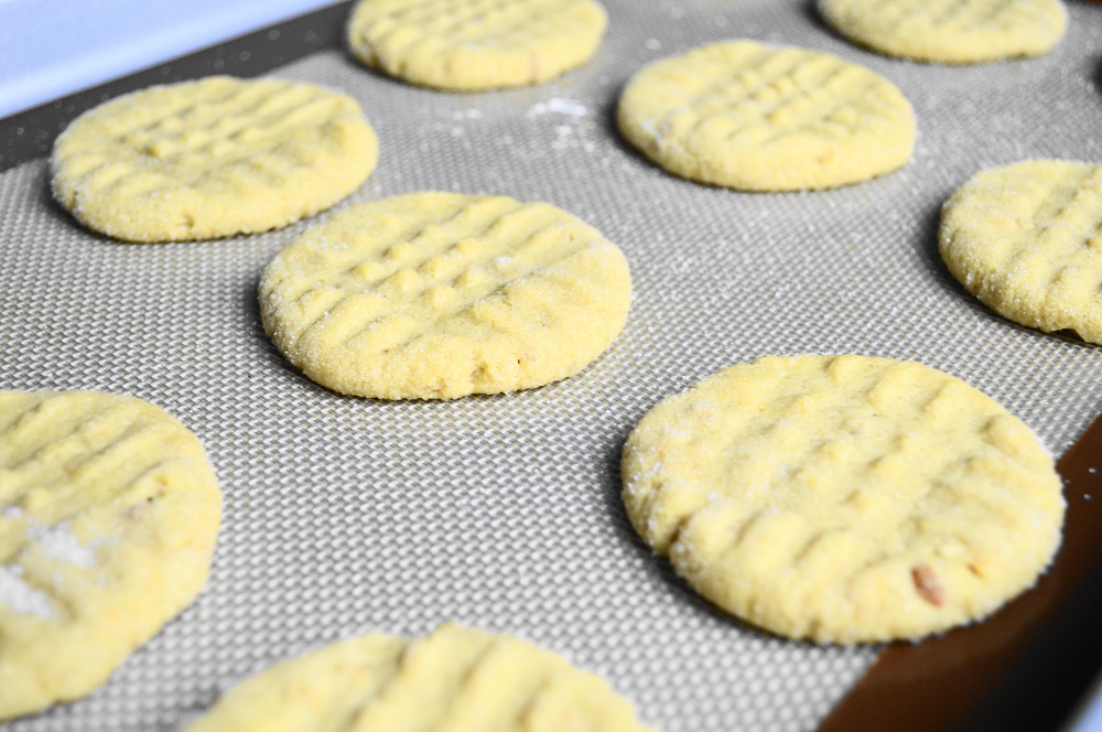 The peanut butter cookies needed to bake for 12 minutes to get perfectly golden. I baked them in batches of two trays at a time. Rotating them halfway through ensured they would bake evenly!