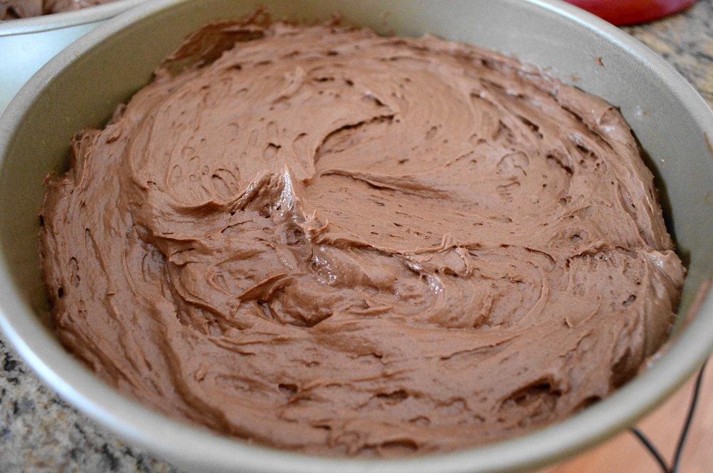 I made sure to line my cake pans with parchment paper and spray them well with cooking spray. It would have been heartbreaking in the worst way if the cakes didn't release from the pans!