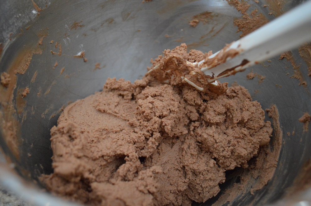 While the chocolate hazelnut cake layers baked and cooled, I made the simple buttercream frosting. All it took was butter, chocolate hazelnut spread and powdered sugar whipped together! 