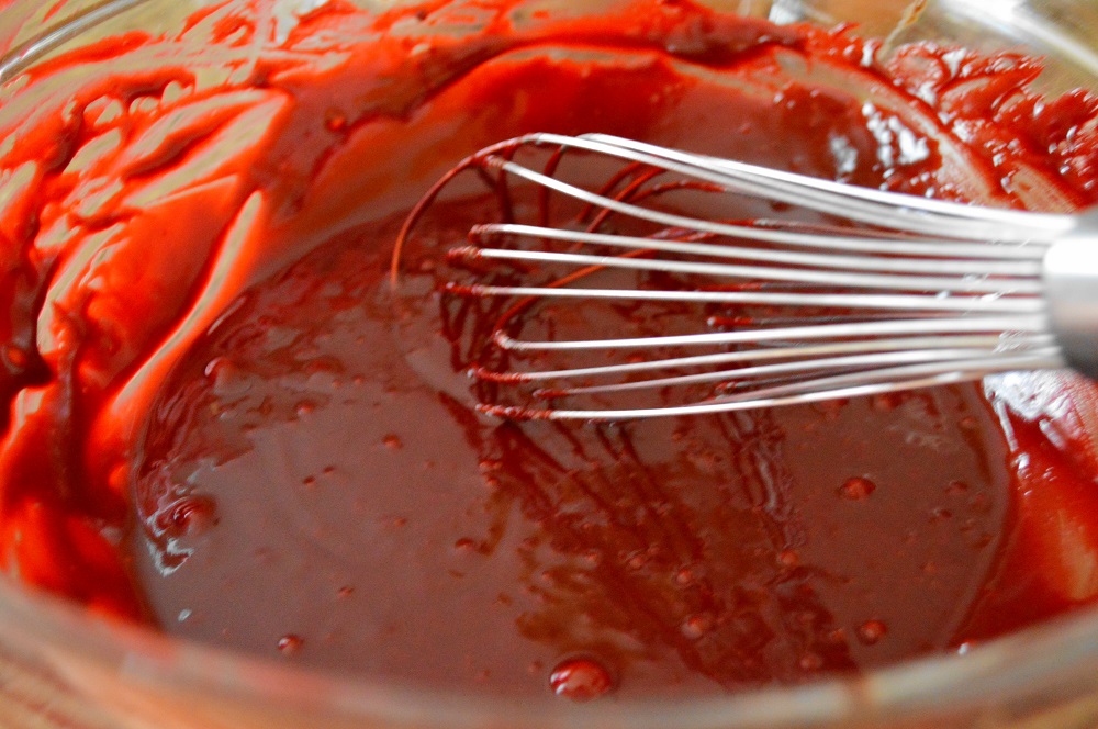 I prepared the brownie batter for the red velvet cheesecake hearts first. It was so thick and gooey and chocolatey! Red food coloring made it the perfect color for Valentine's Day. 