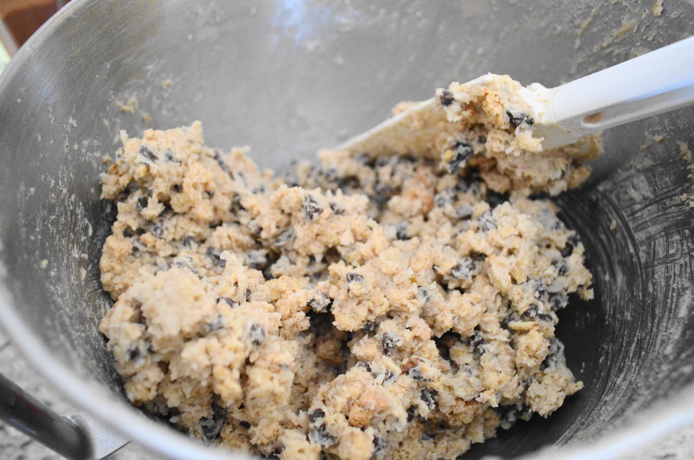 That mixture was folded in to a (somewhat) basic cookie dough. Instead of traditional vanilla extract, I used banana extract. Fruit is tricky in baking sometimes. Dried fruit can suck all of the moisture out of it, but fresh fruit can be too moist. I really wanted to inject some fruity flavor into these chunky granola cookies, so the banana extract was the perfect solution!