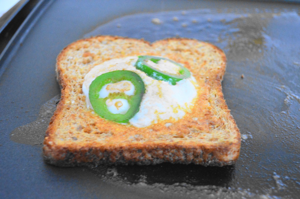 I loved how the jalapeno was all nestled into the egg when I flipped over the spicy egg in the hole! The other side needed to set for just 30 seconds and then it was ready.