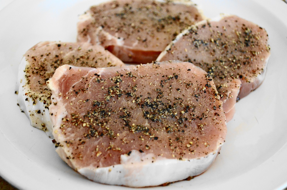 The "au poivre" in these pork chops au poivre was just lots of freshly cracked black pepper. Each of my beautiful pork chops was lightly coated in it to give them huge flavor!