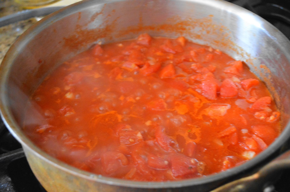 First, I made what I will affectionately call the purgatory mixture. It was a simple combination of onion, garlic, and diced tomatoes. The fiery kick came in from lots of crushed red pepper and smoked paprika. 