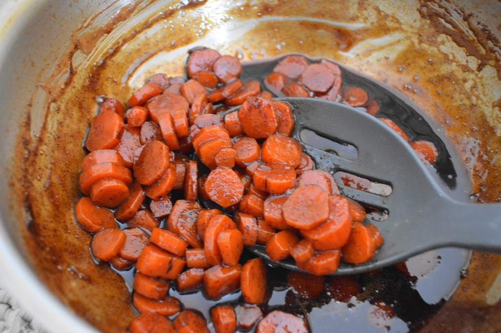 That was all there was to making the whiskey glazed carrots! When it was done, there was excess syrup in the pot. Um, yay! Hello topping for pancakes, waffles, or ice cream! 