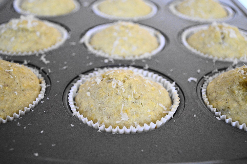 When they came out I sprinkled the muffins with more parmesan on top. Again, it just seemed like the proper Italian thing to do. I did it while the parmesan pesto muffins were still hot so that it would meld right in with them. 