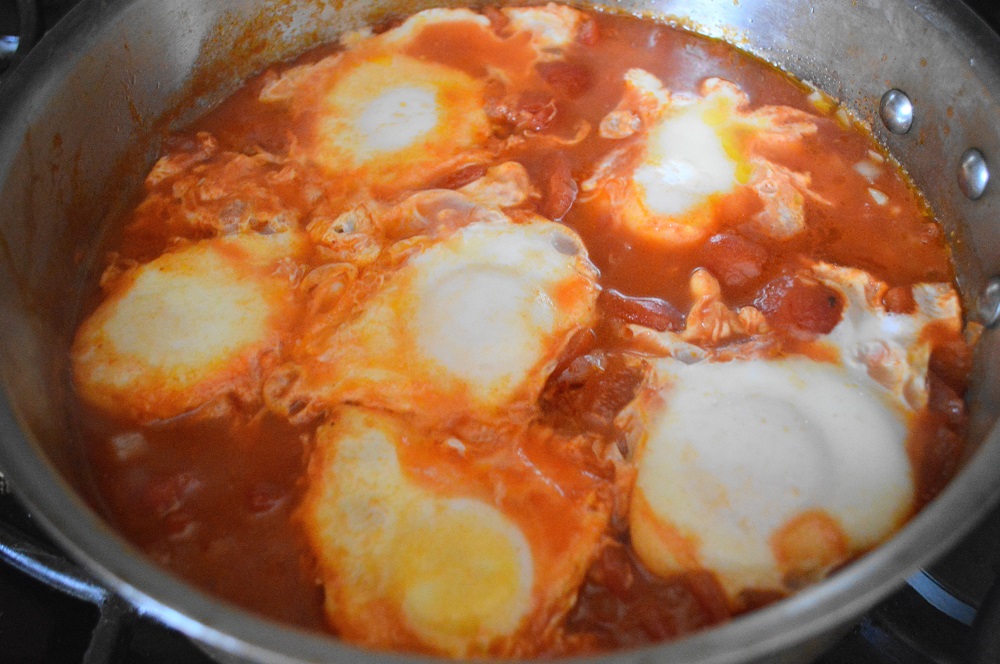 The eggs needed to poach with the pan's lid on for just 2 to 3 minutes to set. I told you this eggs in purgatory was a fast dish!