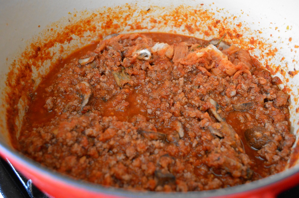 It wouldn't be much of a lasagna bolognese without an amazing bolognese sauce! I started that first since it needed to cook the longest. I used beef, pork and veal as the meat to get all of those different flavors. The secret though was my sachet of flavor. I wrapped rosemary, thyme, peppercorns and the rind from my wedge of parmesan in cheesecloth and submerged it in the sauce. Then it cooked low and slow for two hours!