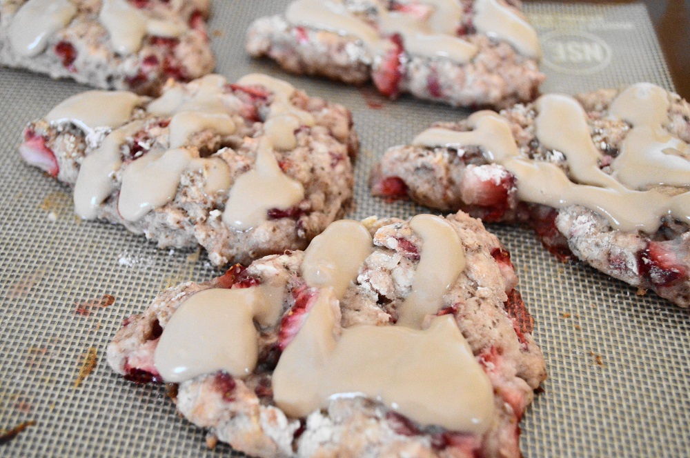 When they came out, I let them cool for a few minutes before drizzling them with a sensational topping. It was an easy mixture of mascarpone, powdered sugar, strawberry balsamic vinegar, vanilla and water to thin it out. It was perfect for drizzling on the strawberry mascarpone scones!