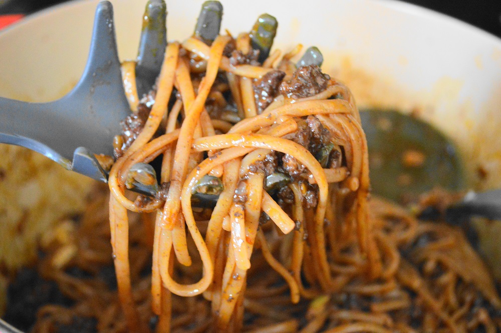 Once the linguine finished cooking in the sauce, I tossed it with some extra butter and lots of parmesan cheese. That was all there was to making this delectable beefy red wine linguine! 