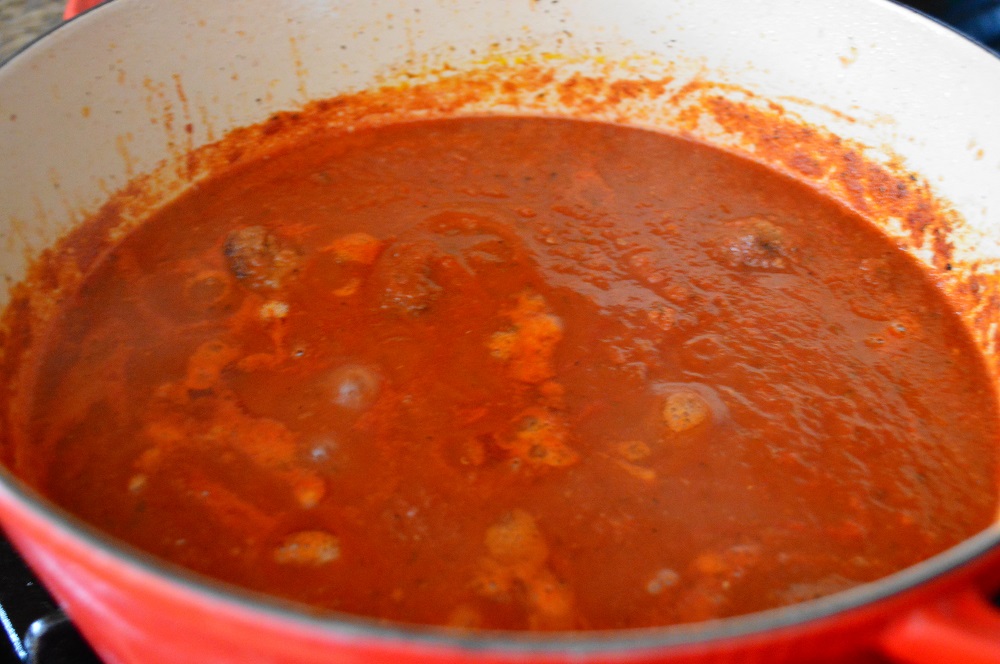 Browning the meatballs in the pot also set down a great flavor base for the sauce of the spaghetti and meatballs. Once I had the sauce simmering, the meatballs went back in and just let it go for 3 hours. The smell in the house was to die for! 