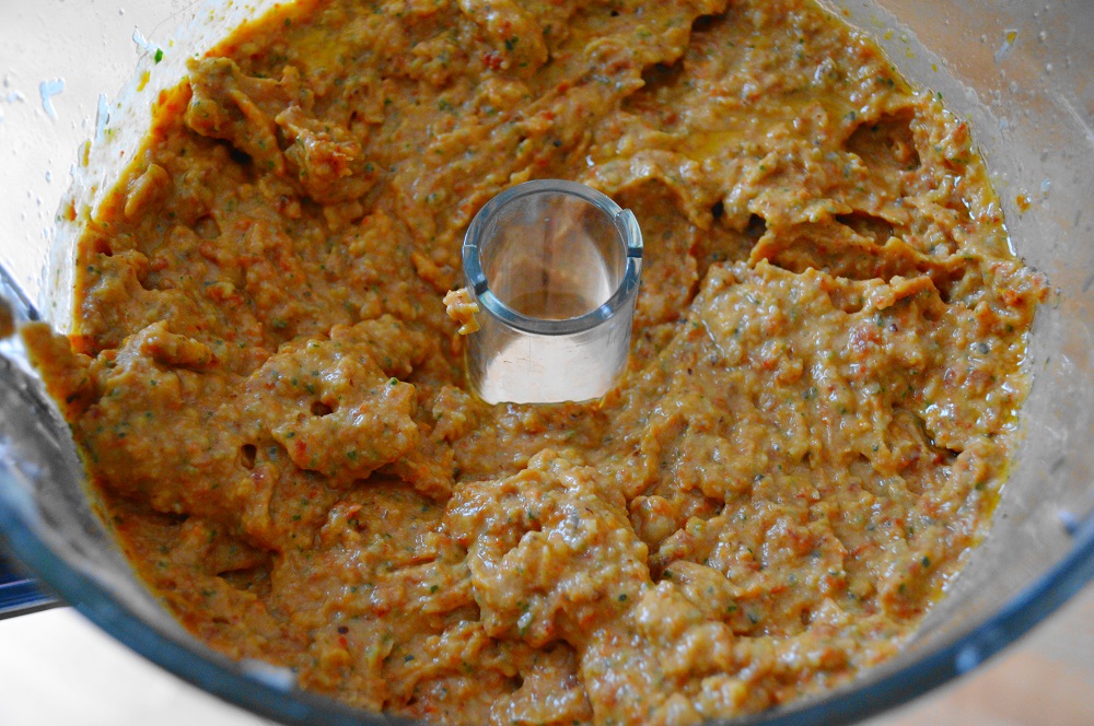 The pesto sauce for the farfalle toscana came together quickly and easily in my food processor. It was the most amazing mixture of white beans, sun dried tomatoes, basil, lemon zest, garlic, olive oil, cheese and hazelnuts. Once it was pureed together, it was such a glorious sauce with a pretty color!