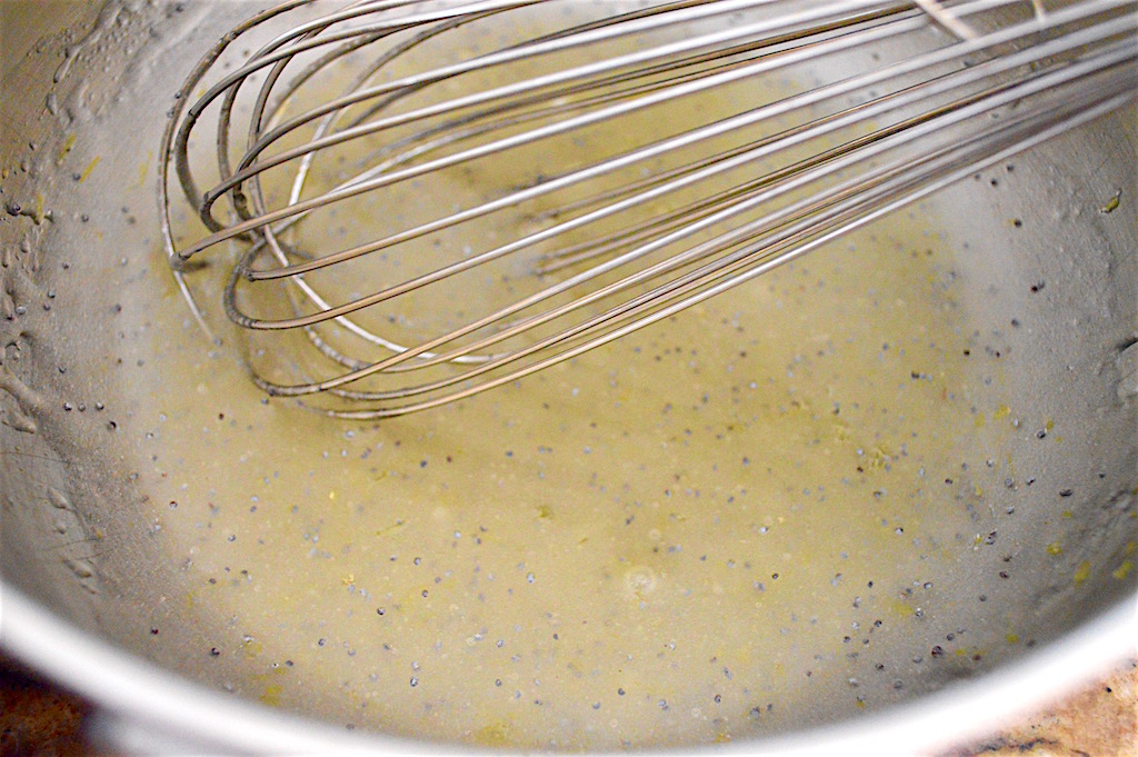 I made an incredible and super simple lemon poppy seed dressing to toss with the berry basil salad. I whisked lemon zest, lemon juice, sugar, salt and ground mustard together as a base. Stay with me on the ground mustard. It kept it from becoming cloying! Then I whisked in canola oil to bring it together and then the poppy seeds. It was fast and so perfect!