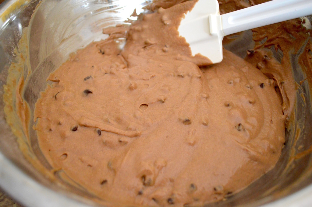 From there the batter came together quickly. I love how easy muffin batter is! The wet ingredients were just whisked into the dry ingredients. Then I folded in lots of chocolate chips. 