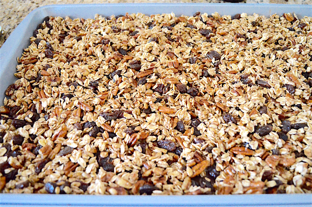 That lovely mixture was spread out into a thin layer on my sheet tray. I made sure to line the sheet tray with a silicone mat and also grease it with some olive oil. That did two things! It helped make sure the maple pecan granola didn't stick, and also gave another dimension of flavor. 