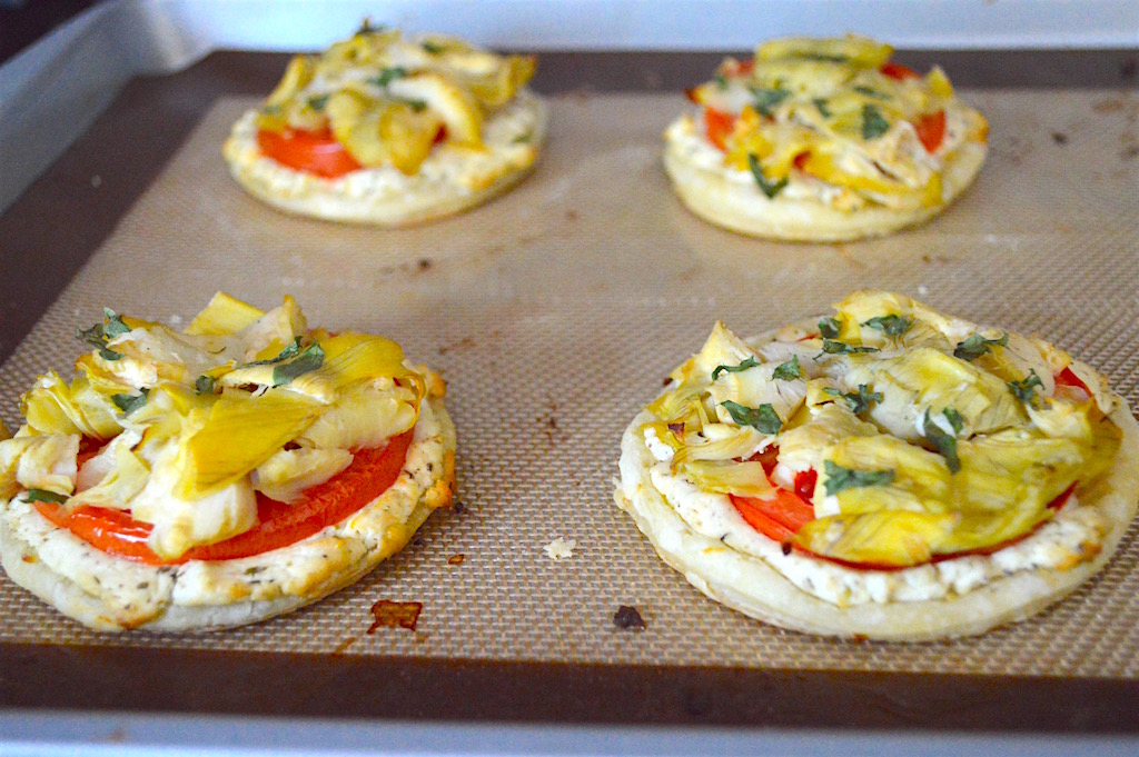 The artichoke, tomato and goat cheese tartlets baked for 25 to 30 minutes! The puff pastry became all crispy, flaky and glorious while the goat cheese got all melty and gooey. It was perfection! These babies were best served immediately. 