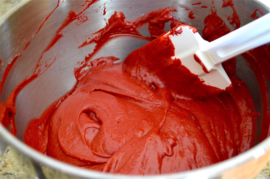 Oh goodness do I love that color on the batter for the red velvet cake! It came together easily in my beloved stand mixer. My little secret was to use Godiva chocolate liqueur to really bring home that chocolate flavor. 