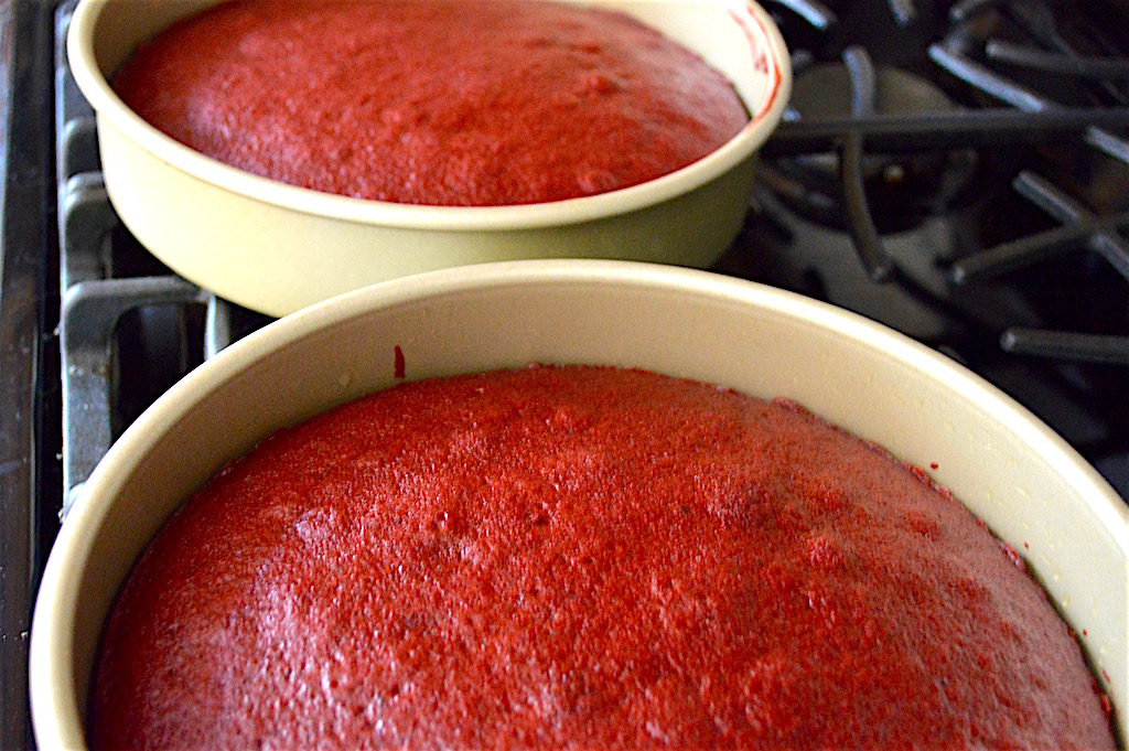 The red velvet cake took about 30 minutes to bake in my very well lined and greased cake pans. When they came out I let them cool completely for an hour before I even touched them. It made them much easier to manage!