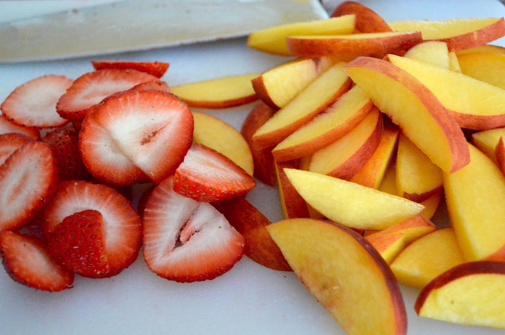 The peaches were still looking absolutely gorgeous around here, and that's partly what inspired this white peach sangria. Using seasonal fruit was definitely the best way to go. I also used lots of sliced strawberries and blueberries, which really complimented the peaches! 