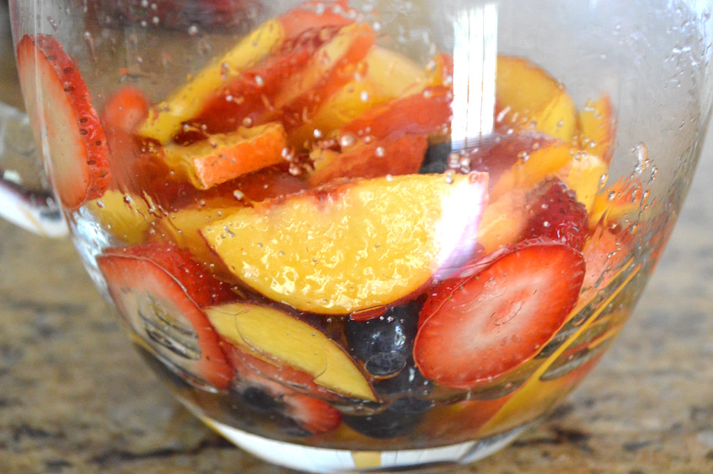 All of that scrumptious fruit was mixed with a little rum and sugar in my pitcher. The spiced rum I used was perfect for reinforcing the summer vibe I wanted! Then the key was to let that mixture sit in the refrigerator for at least 3 hours. That way the fruit could develop flavor and release their lovely juices. 