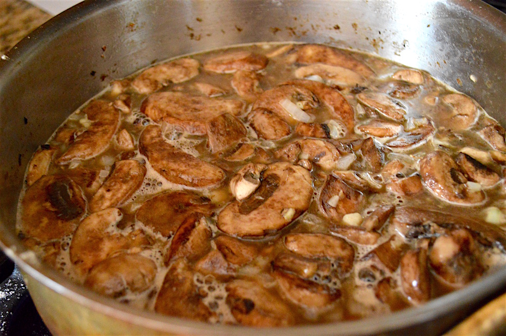 After I browned the chicken for a couple of minutes on each side, I set them side and started on the sauce for the chicken marsala. The flavorful base that the chicken left behind was the perfect sauce starter! I used loads of meaty, amazing cremini mushrooms with aromatics, marsala wine and chicken stock. When it all melded together it was absolutely glorious!