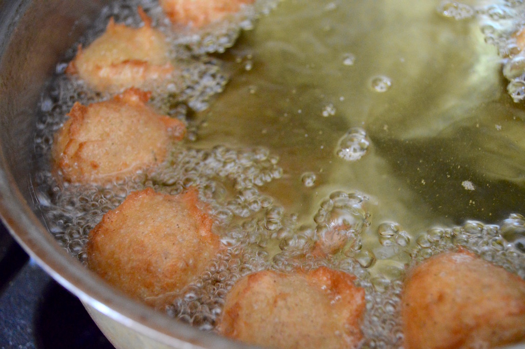 I added eggs to the dough after I moved it to a bowl and let it cool a little. It was really sticky and wet, which was perfect. Then I used my beloved cookie scoop to drop perfect dollops of that dough into my hot oil. The lemon lavender zeppole puffed up and browned so gorgeously! They took about 5-6 minutes to cook through and become crispy. 