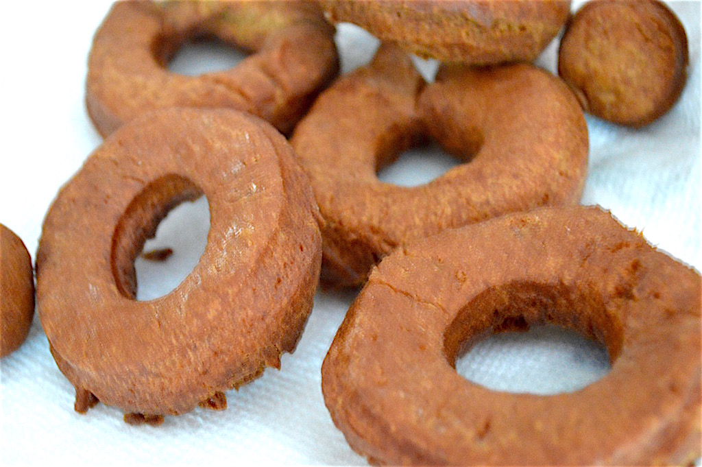 Then all I had to do was fry up my apple cider donuts in batches! They only took about a minute on each side to get gorgeously puffy and golden. I drained them on a plate lined with paper towel when they were done. 