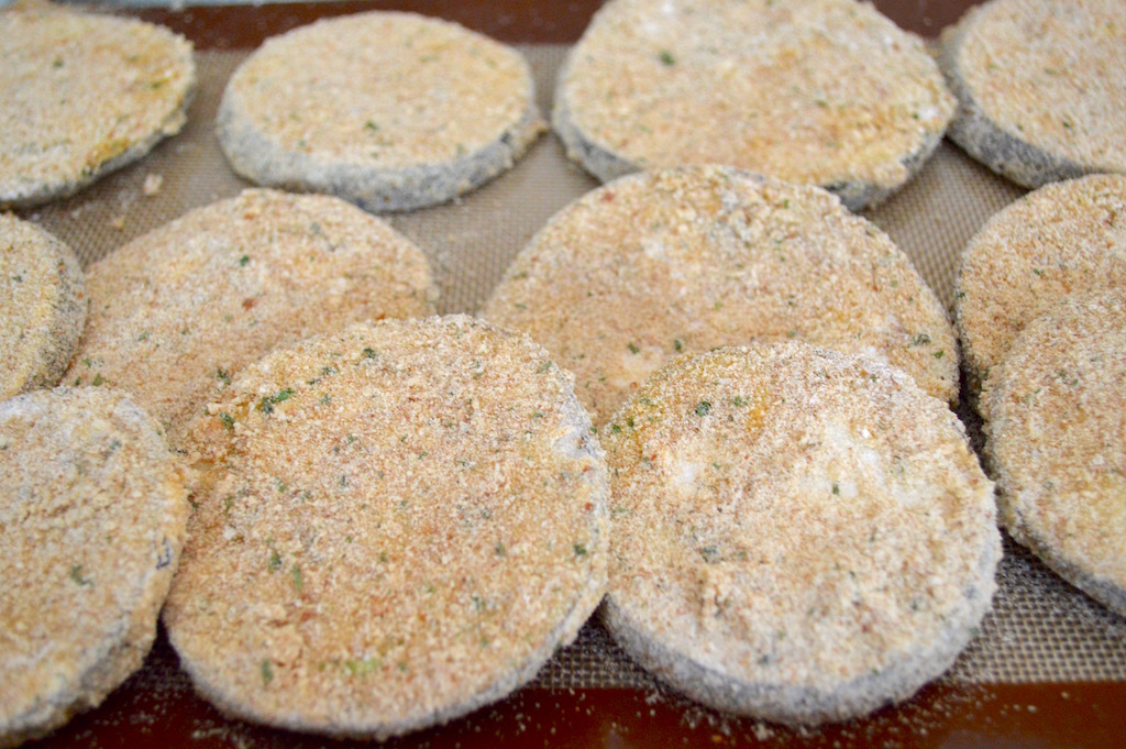 Once that was done, I put the eggplant through a standard breading line with seasoned flour first, then an egg mixture, and finally seasoned breadcrumbs to coat them thoroughly. 