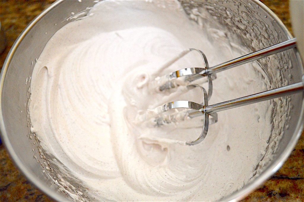 The other main component of the pistachio rose cookies was egg whites. I whipped them up until they were like shiny clouds with cinnamon, a little salt, rose water and a little more sugar. Then I just mixed in the pistachio mixture and flour to bring it together into a sticky dough. It was such a simple dough that came together easily with my hand mixer!