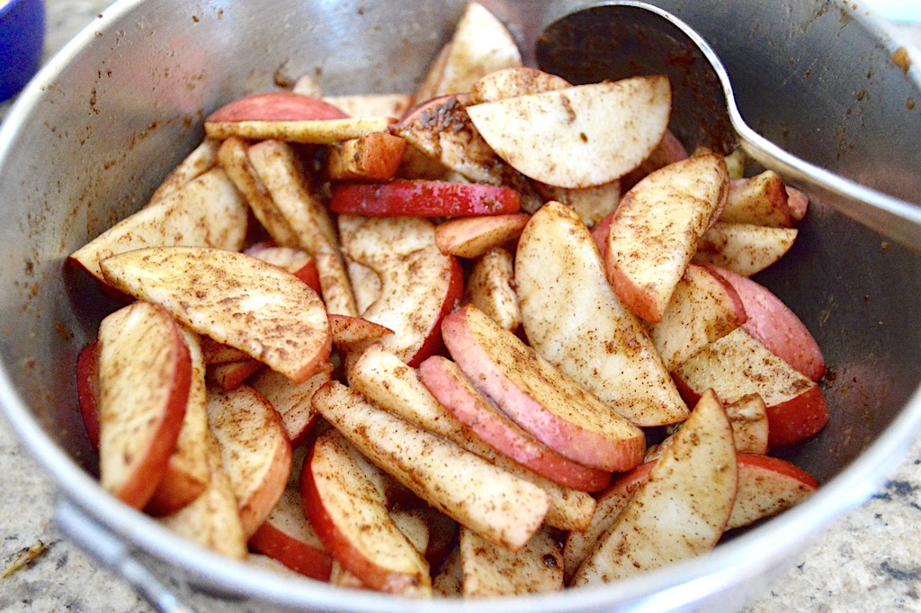 The filling of the apple cheddar pie bread pudding was also really simple. I sliced 4 of my gorgeous apples, and then stirred them with brown sugar and cinnamon. The sugar drew out some of the juices from the apples and made them glisten. They were basically marinating in their own sweet juices and it was glorious! 