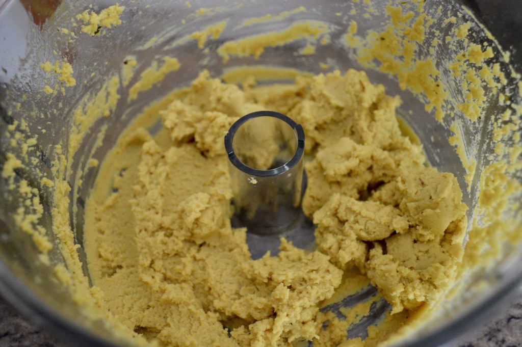 Then I transferred that super flavorful chickpea mixture right into my food processor. To it I added lemon juice, tahini paste and more olive oil to bring it all together into a luscious dip. It could not have been easier to make this classic chickpea hummus! 