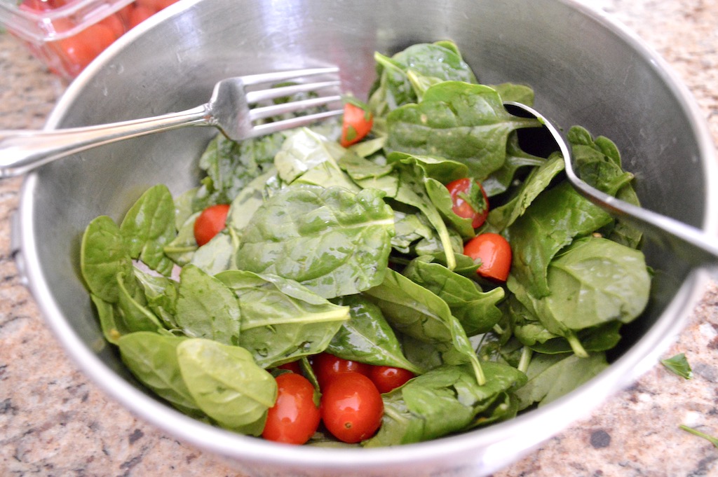 While the chicken sat in the marinade, I made a simple salad to top the chicken shawarma. I just tossed lots of baby spinach, grape tomatoes, cilantro and lemon juice together. It had so much bright, fresh flavor on its own! 