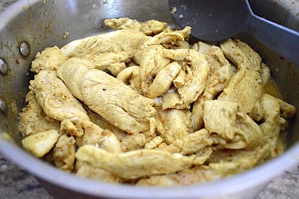 Once the chicken finished taking its lovely bath, I poured it right into a hot skillet. It cooked in its marinade for 10-15 minutes. It smelled so incredible as it cooked!