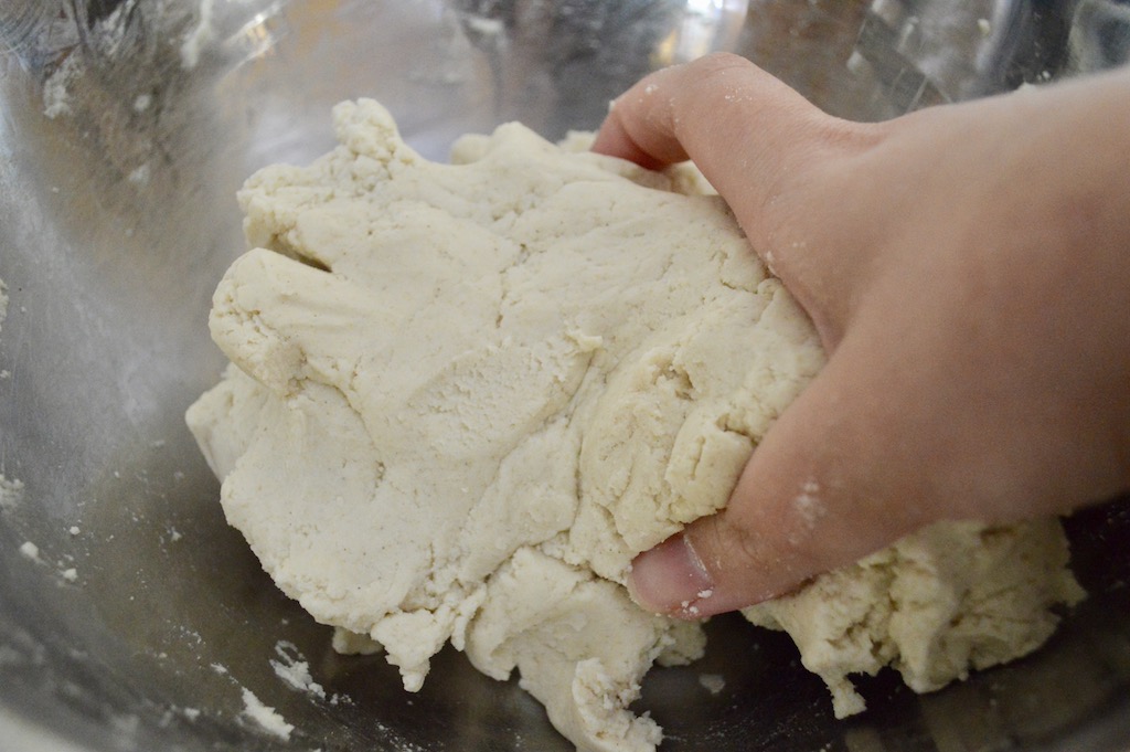 The next day it was time to make the simple masa dough. The flour was the essential part. I used Maseca masa flour, which is the best for Salvadoran pupusas. A spoon was not allowed here. Clean hands were the best for bringing it together! 